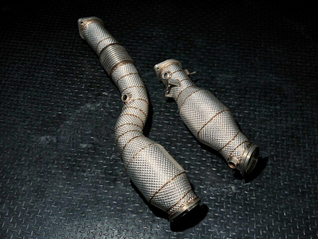 Heat-wrapped S58 downpipes viewed from above
