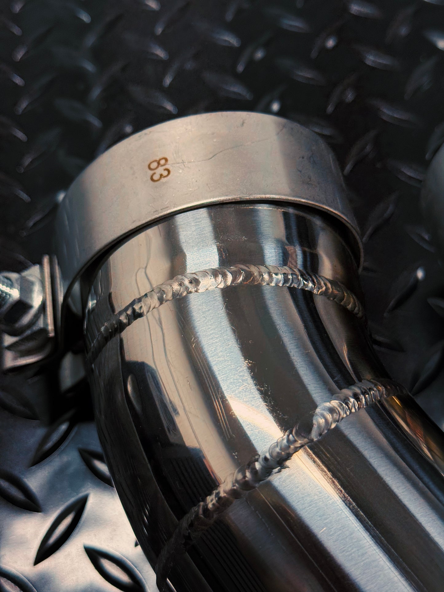Back-purged TIG weld detail on the MACH-1 with band clamp